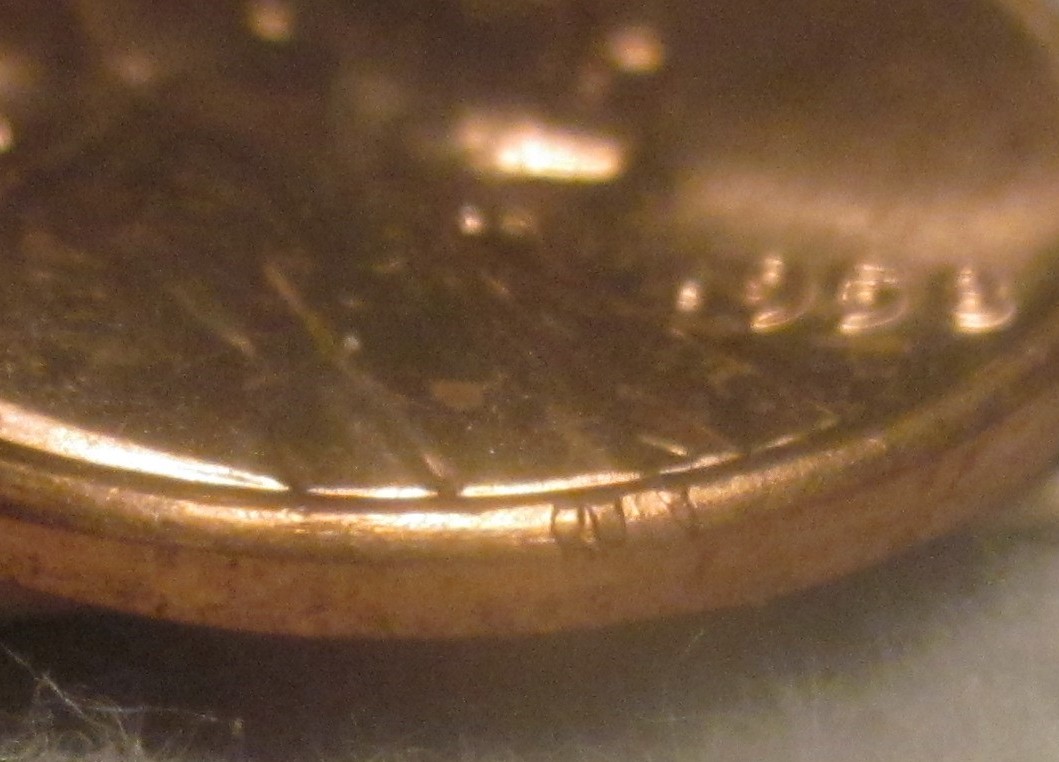 1958-Wheat-Penny-With-Part-Of-Lettering-Stamped-On-Rim/Edge?